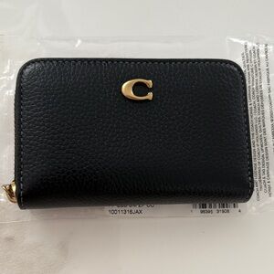 Coach Black Pebbled Leather Zip Card Case with Gold 'C' Accent